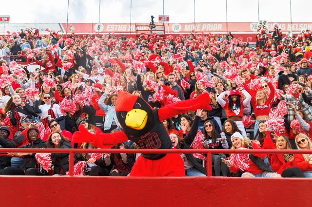 crowd of illinois state students and reggie redbird in bleachers