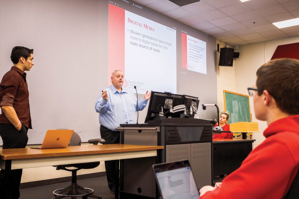 Dr. Joseph Zompetti, professor in the School of Communication, presents his "Improving Digital Literacy" lecture to Dr. Harriett Steinbach’s United States Government and Civic Practices class.