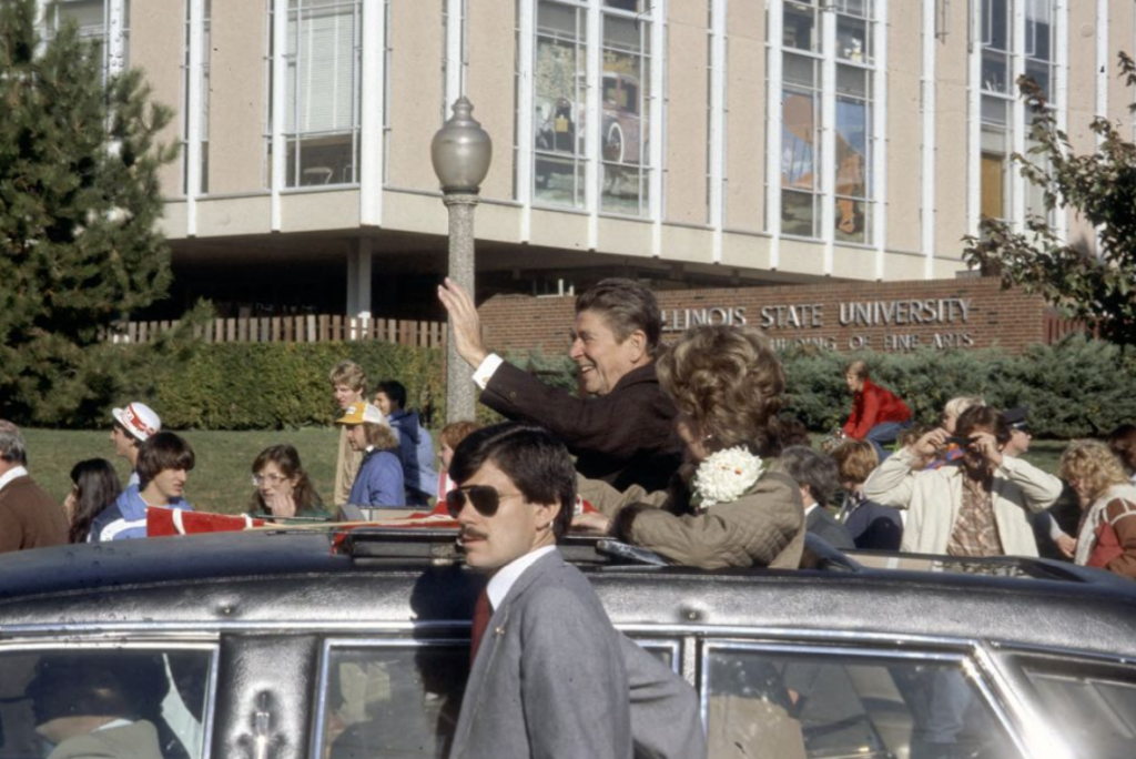 Ronald Regan waves from a car in Illinois State's Homecoming parade