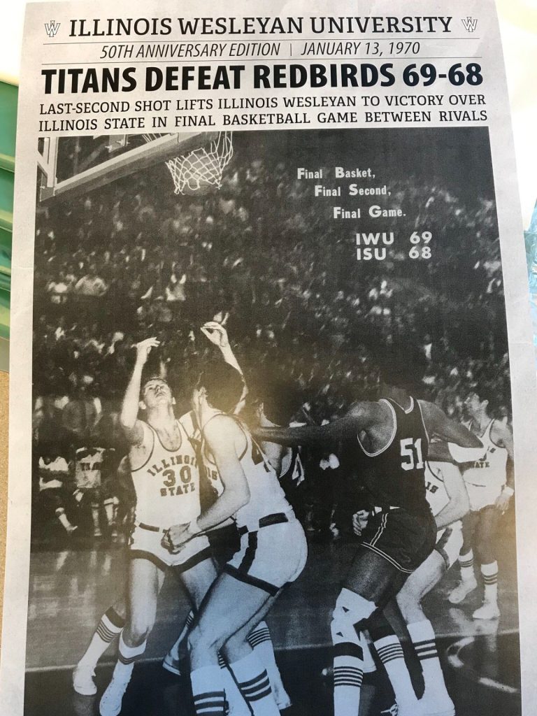 Poster that displays black and white photo of basketball players.
