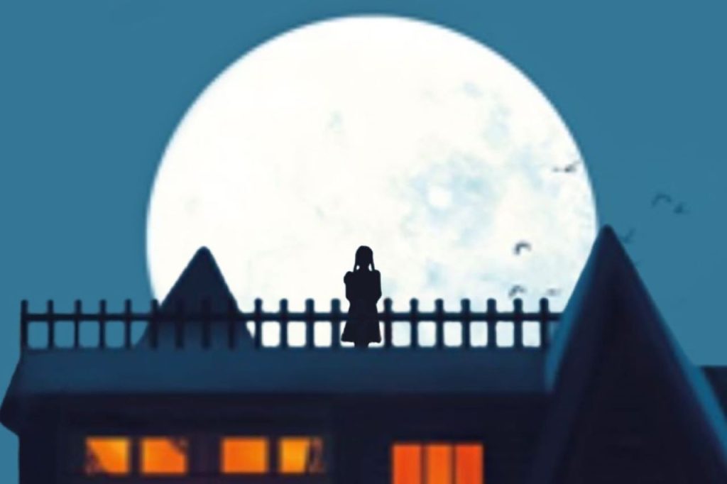 An edited version of The Addams Family: A New Musical Comedy poster image. It is zoomed in on the roof of the mansion where a silhouette of Wednesday Addams stands with the moon rising behind her.