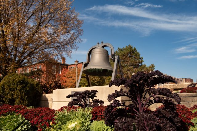 Old Main Bell on the Quad during fall.