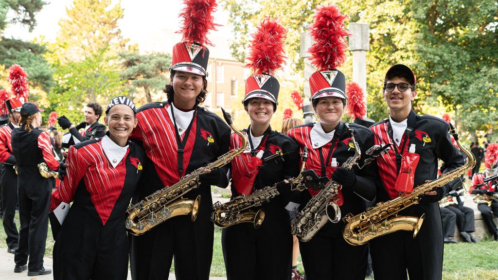 Members of the Big Red Marching Machine holding their instruments