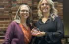 head and shoulder image of awardee and nominator pose for the Living Our Values award