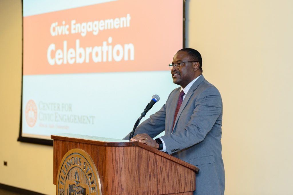 Illinois State University Interim President Aondover Tarhule presents at the 2023 Civic Engagement Celebration.