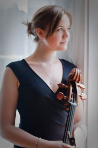 Headshot of Instructional Assistant Professor Cora Swenson Lee, cello