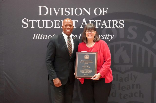 Picture of Gamsky award winner Dawn Pote with Student Affairs VP Levester Johnson.