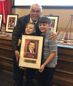 Tom Lamonica celebrates his Hall of Fame induction with two grandsons.