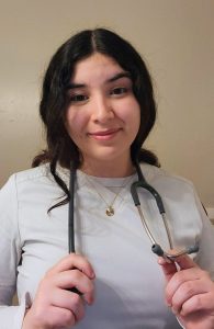 Samantha Charlton headshot while holding stethoscope around her neck