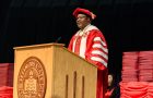 President Tarhule standing at a podium during commencement