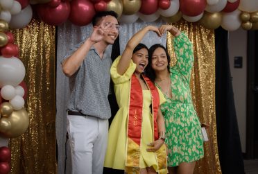 Three people posing together at the Middle Eastern, Asian, Pacific Islander, and Southeast Asian recognition ceremony.