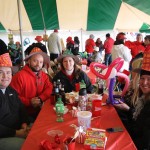 College of Education alumni, faculty, staff, and students #BackTheBirds at the College of Education's circus themed tailgate tent. 