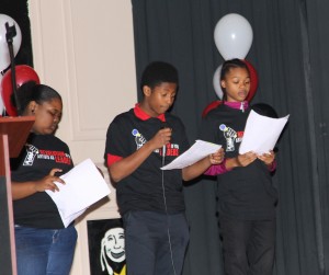 John G. Cook students perform their group poetry slam pieces. 