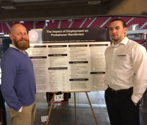Criminal Justice Sciences Professor Jason Ingram and master's student Clayton Cottle at the University Research Symposium