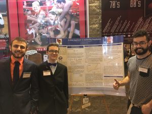 Santiago Pinto (right) with fellow researchers Joshua Henderson (left) and Cory Russ at the University Research Symposium
