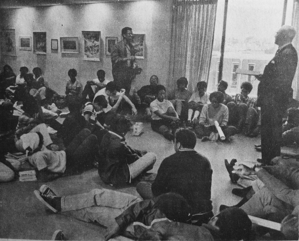 President Braden speaking with student protesters during a fall 1968 sit-in