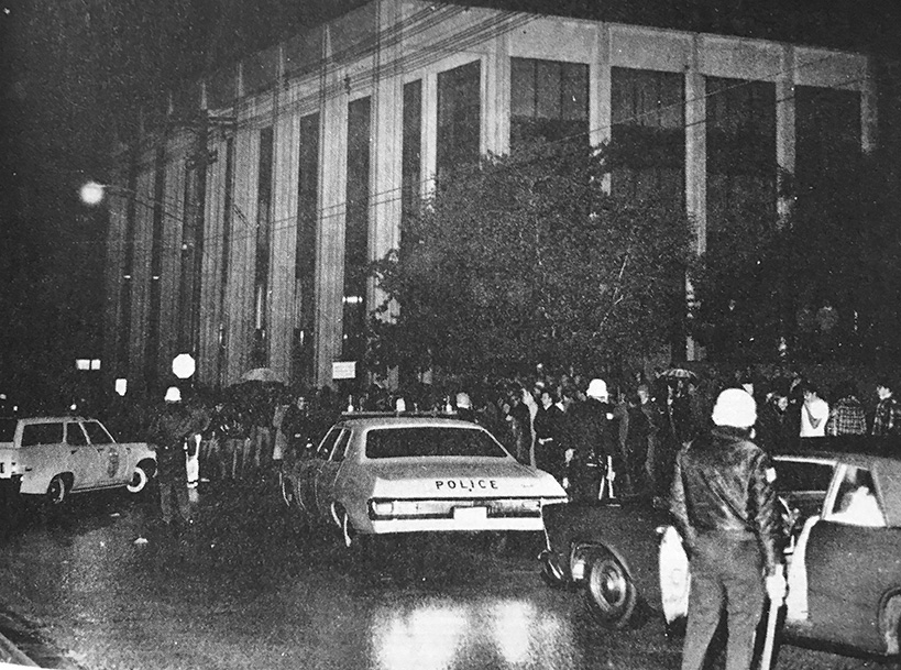 Police cars converge outside Hovey Hall on North Street, May 14, 1970