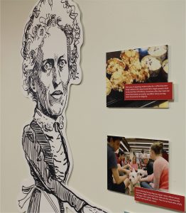 Oversized cutout of Ange V. Milner, the long-time Illinois State University librarian.