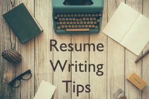 Image of a typewriter, pencil, glasses, and paper with the words Resume Writing Tips in the image