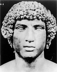 photo of a carved bust of a Roman athlete