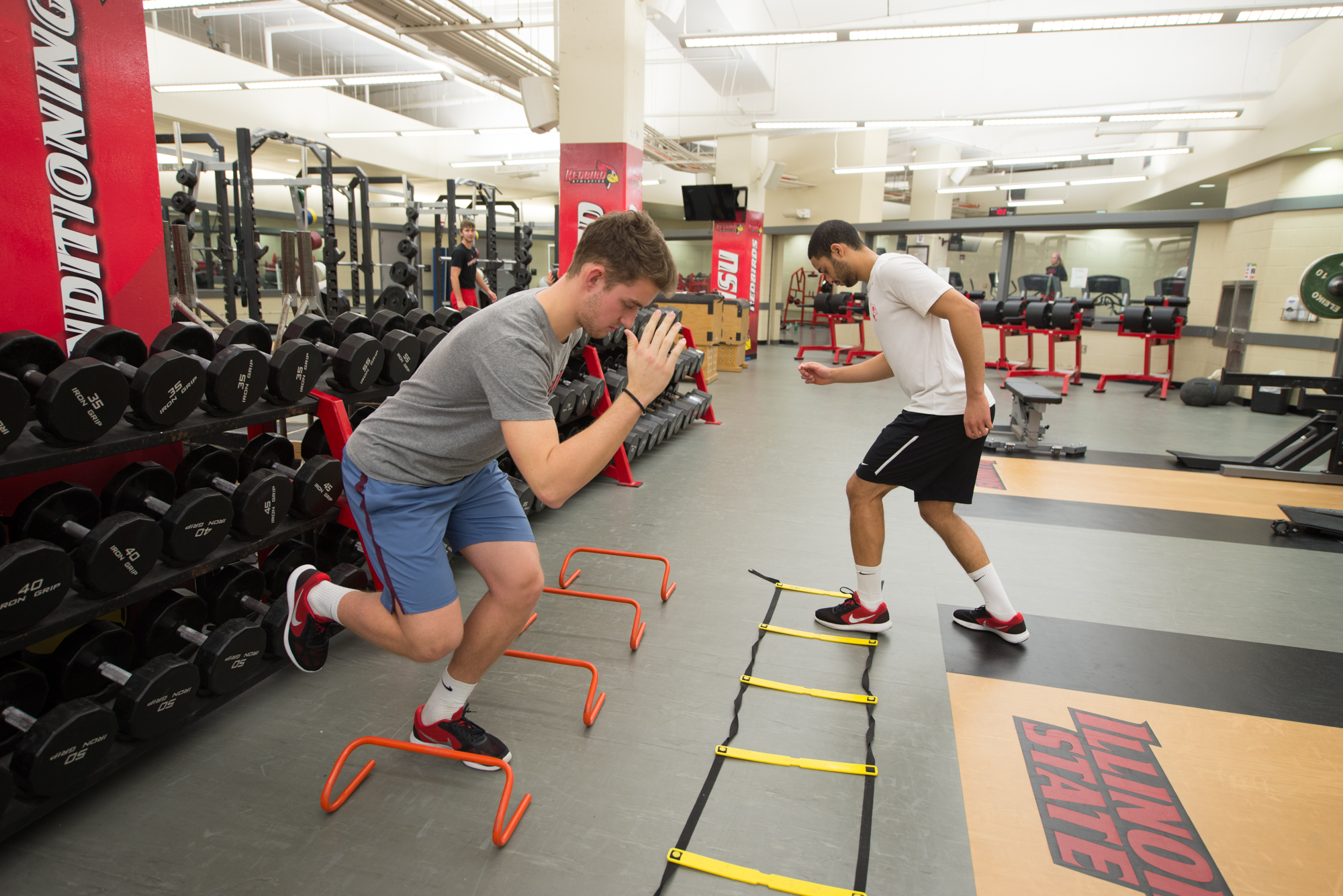 Manuel Bernhard and Cameron Petersen working out in the Owen Strength and Conditioning Center