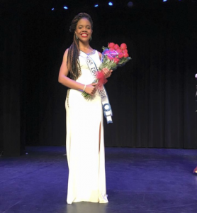 Lauren Chapman on stage at a pageant