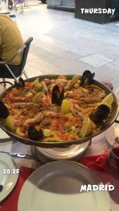 Paella with 20:25 and Thursday and Madrid written on the photo
