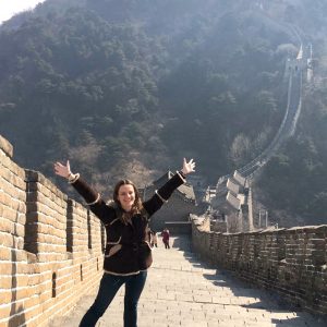 Beth Hollander teaches music in China, and has traveled to five continents and 14 countries. Here she is at the Great Wall of China.