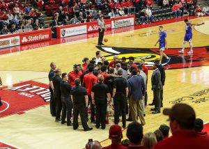 The student-managers form the glue that holds the men's basketball team together.