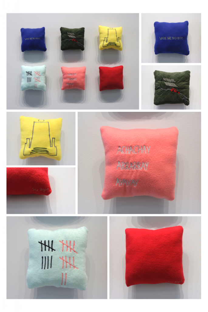Pillows made by Camila Pasquel that represent her home country of Ecuador and the immigrant's experience