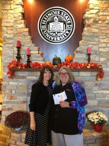 Director of Development Toni Burningham with Milner Library Interim Dean Dr. Shari Zeck after Zeck signed her gift commitment to establish the Doris Grube Zeck Library Outreach Restricted Fund.