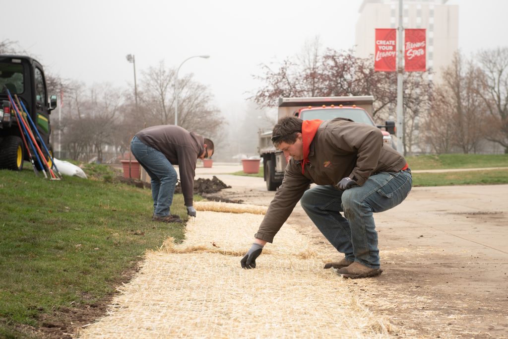 Men work on grounds