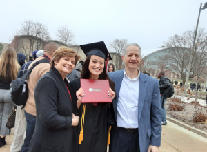 Faith with parents Helene and Gerard Fosco at the 2019 commencement ceremonies.