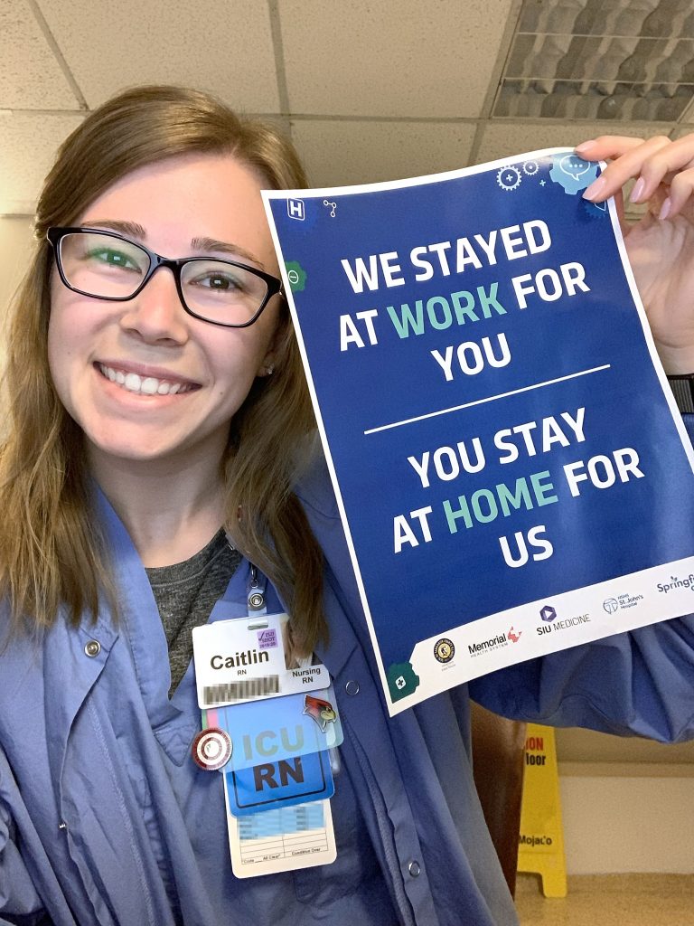 Caitlin Sims, class of 2019, in her nursing uniform