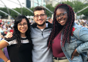 Illinois State Special Education graduate Edward Blanco ’19 pictured at Fiesta del Sol in Pilsen during STEP-UP 2018 with fellow participants Ana Karen Ramirez and Da’Mara Smith